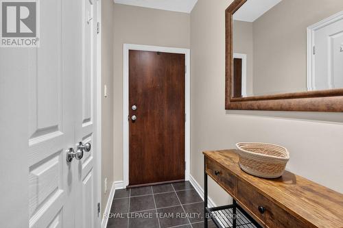 Tiled Foyer leads to open concept main space. - B - 1004 Beryl Private, Ottawa, ON 