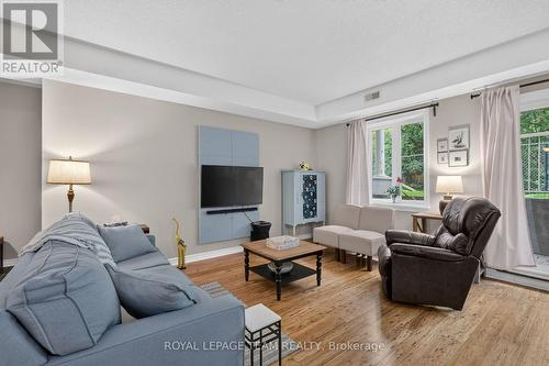 Warm hardwood flooring in Living/Dining areas. - B - 1004 Beryl Private, Ottawa, ON 