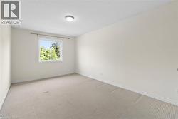 Recessed lighting and a single window with a privacy rod - 