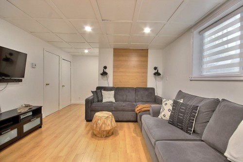 Family Room - 33 Av. Richelieu, Rouyn-Noranda, QC 