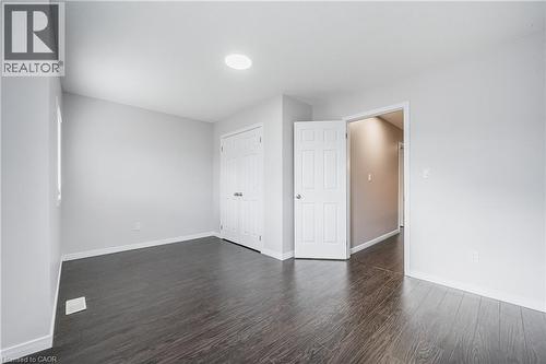 Recessed ceiling lighting, wood-finish flooring, and white interior doors - 224 Jessica Crescent Unit# B, Kitchener, ON 