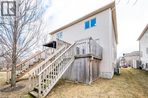 Cream-colored horizontal siding exterior with multiple windows - 224 Jessica Crescent Unit# B, Kitchener, ON 