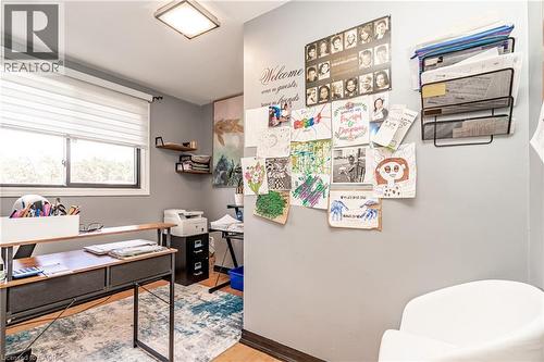 Recessed lighting, wood-finish flooring, and a window with blinds - 52 Charters Road, Brampton, ON 