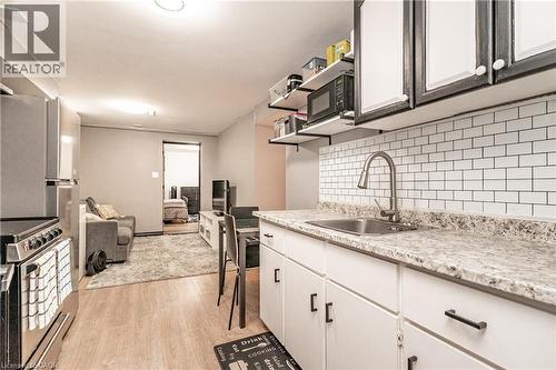 White subway tile backsplash with light-toned countertops - 52 Charters Road, Brampton, ON 