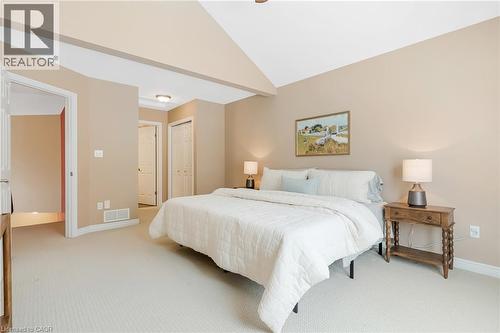Vaulted ceiling, neutral wall tones, flush mount lighting, and carpet flooring - 227 Chestnut Hill Crescent, Kitchener, ON 