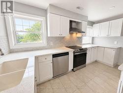 Bright updated kitchen SS appliances - 
