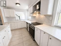 Quartz counters tons of cupboards - 