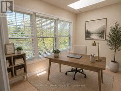 Den Virtually Staged as an office - 