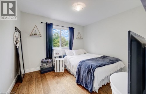 Hardwood flooring, recessed lighting, and a window with exterior views - 245 Fern Crescent, Waterloo, ON 