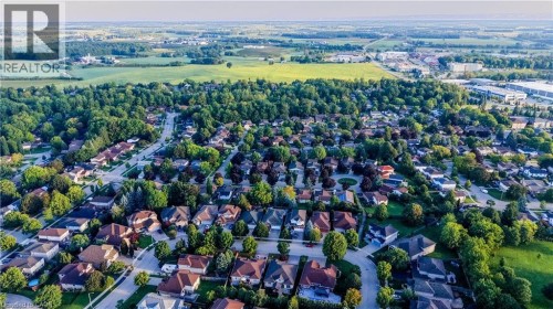Residential neighborhood with mature trees and surrounding green spaces - 245 Fern Crescent, Waterloo, ON 