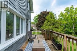 Exterior featuring horizontal siding and multiple windows - 