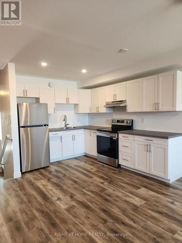203 - 9 QUEEN STREET W , Springwater, Ontario L0L 1P0 5