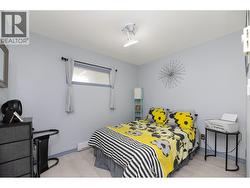 The second bedroom offers space for guests, hobbies or an additional home office. - 