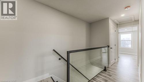 Glass panel and black metal railing system - 152 Overlea Drive, Kitchener, ON 