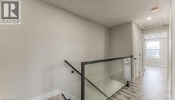 Glass panel and black metal railing system - 