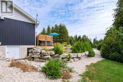 Access to crawl space is simple with outside door. - 