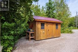 Garden shed, potting bench, lawn tractor (8'x12') - 