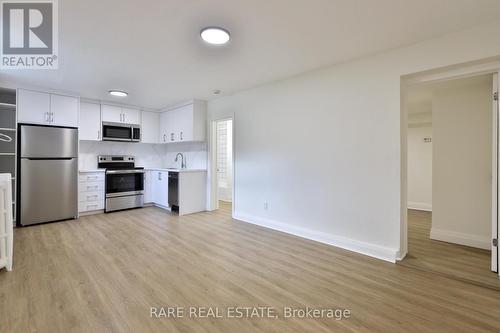 A - 2369 QUEEN STREET E , Toronto, Ontario M4E 1H2 3