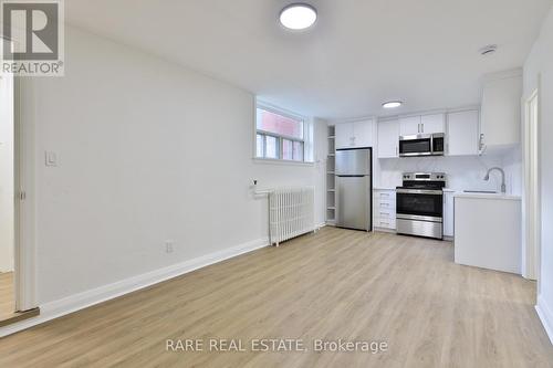 A - 2369 QUEEN STREET E , Toronto, Ontario M4E 1H2 5