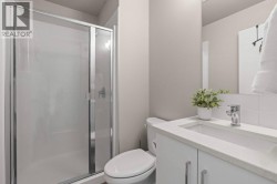 One of Two Bathrooms - 