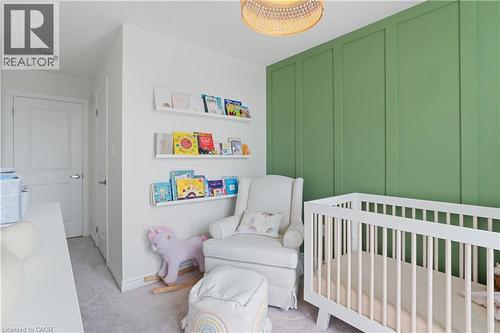 Accent wall featuring vertical paneling - 68 Barkerville Drive, Whitby, ON 