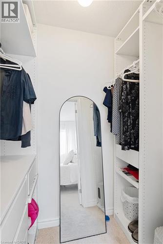 Built-in shelving units, integrated clothing rods, and drawer storage - 68 Barkerville Drive, Whitby, ON 