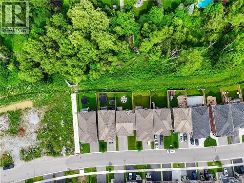 Residential properties featuring pitched roofs and paved driveways - 68 Barkerville Drive, Whitby, ON 