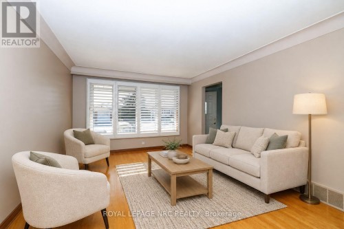 virtually staged living room - 38 Rivercrest Road, Hamilton (Riverdale), ON 