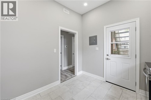 Kitchen with outside access. perfect for sitting area and morning coffee. - 98 Duke Street Unit# 2Nd, Hamilton, ON 