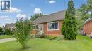 Brick exterior with a gabled roof and white trim - 104 Mausser Avenue, Kitchener, ON 