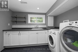 Laudry Room with tons of cabinetry - 