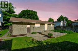 Brick exterior with an asphalt shingle roof - 