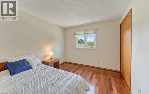 Tidy 3rd bedroom with gleaming Cherry hardwood floors - 238 Mcgarry Drive, Kitchener, ON 