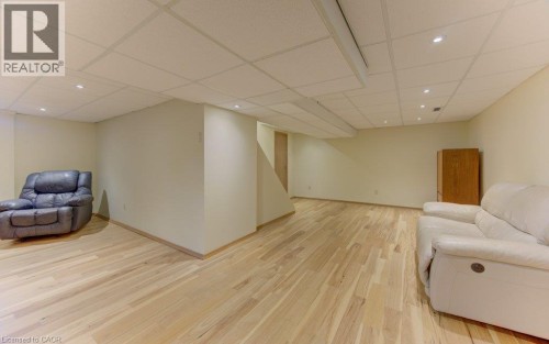 Recreation room with Hickory Engineered hardwood floors - 238 Mcgarry Drive, Kitchener, ON 