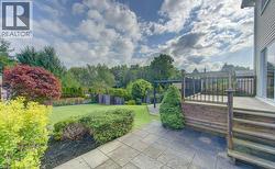 Great backyard for entertaining with two patios and a deck - 