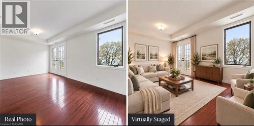 Wood-finish flooring, white walls, double French doors, recessed ceiling, and a large window with black trim - 1389 Lakeshore Road, Burlington, ON 