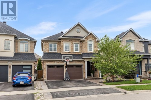 Front of home with double car garage - 3119 Hedges Drive, Burlington, ON 