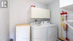 Main-floor laundry-no stairs or heavy baskets. - 