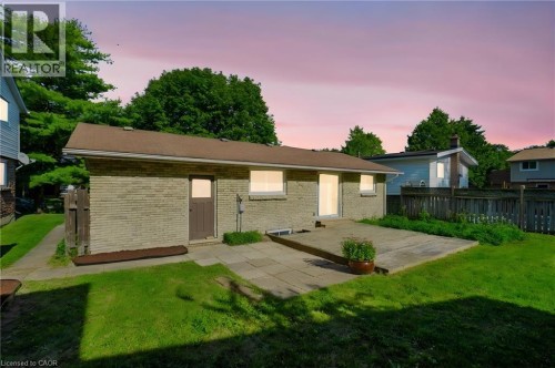 Brick exterior with an asphalt shingle roof - 95 Underhill Crescent, Kitchener, ON 