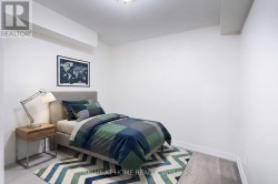 *virtually staged* Lower suite - 2nd bedroom - 