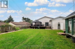 back yard with entrance to garage - 