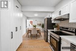 Virtually staged kitchen and dining area - 