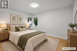 Virtually staged bright and inviting bedroom - 