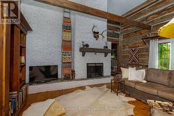 Floor to ceiling wood burning fireplace - 