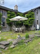 Outdoor dining area at back of house - 