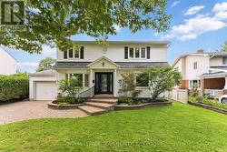 Beautiful curb appeal with long interlock driveway - 