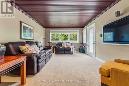 Family room/movie room (main level) - 115 Mountbatten Avenue, Ottawa, ON 