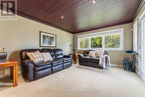Family room/movie room (main level) - 115 Mountbatten Avenue, Ottawa, ON 