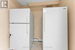 Fridge & Freezer in basement - 