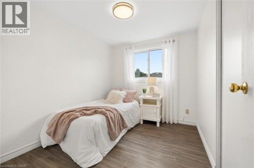 Wood-finish flooring throughout - 76 Cluthe Crescent, Kitchener, ON 